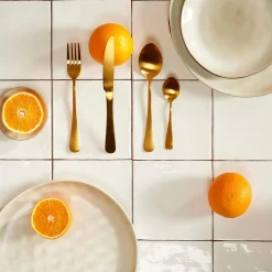 CASA Axelle Cubierto De 16 Piezas Dorado