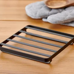 CASA Industria Salvamanteles Negro